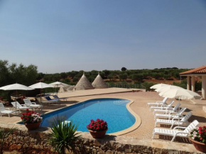 Гостиница Trulli la macchia casa vacanze  Кастеллана-Гротте